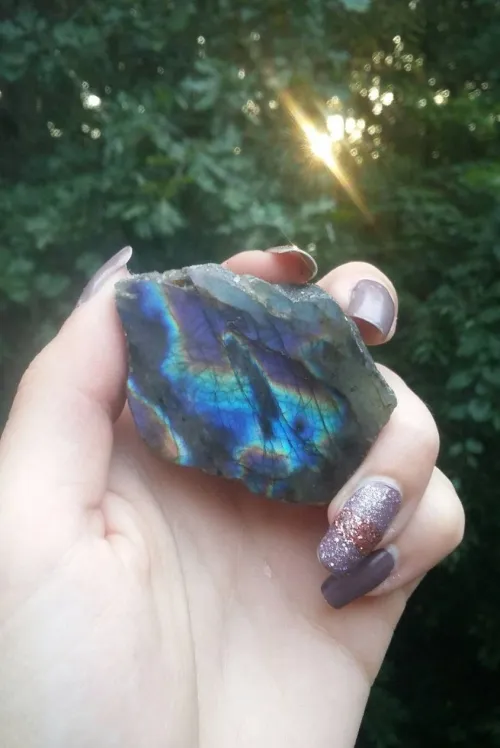 Labradorite showing iridescent flashes under different lighting angles