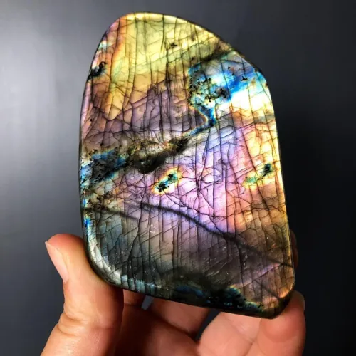 Labradorite stones paired with complementary gems in a holiday setting